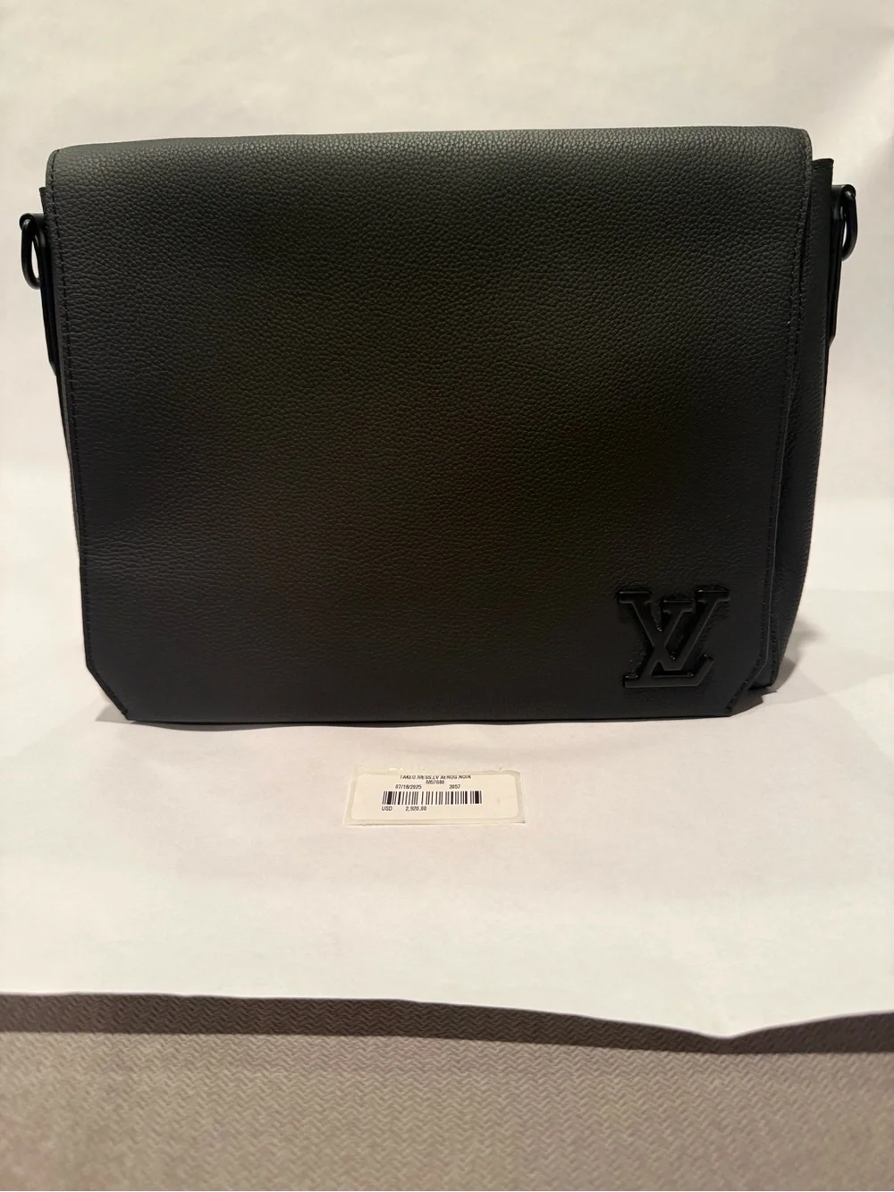 Louis Vuitton Black Pebbled Leather Messenger with LV Initials